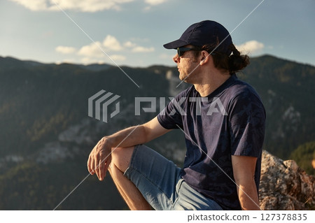 High mountain landscape view in the Dinaric Alps in Montenegro, Man enjoying view 127378835
