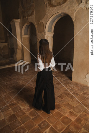 Woman Entering And Walking Inside The Small Old Church Woman Entering And Walking Inside The Small Old Church 127379142