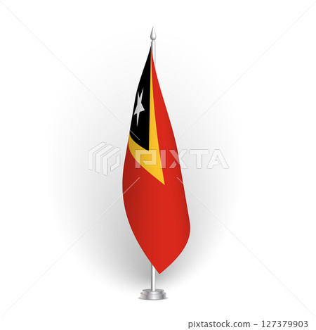 East Timor flag - 3D standard conference flag hanging on ground flagpole. Usable for summit, indoor meeting, board room, government office, press room or reception. Vector flag with shading 127379903