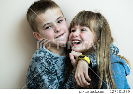 Two children boy and girl fooling around having fun together. Happy childhood concept. 127381289