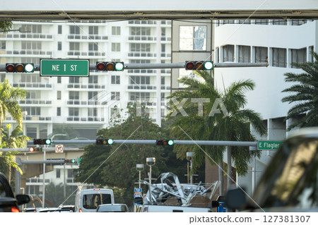 Traffic lights regulating driving cars on city street in Miami, Florida Traffic lights regulating driving cars on city street in Miami, Florida 127381307