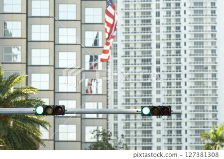 Traffic lights for traffic regulation high above street in Miami, Florida 127381308