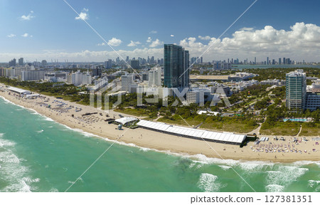 South Beach high luxurious hotels and apartment buildings. American southern seashore of Miami Beach city. Tourist infrastructure in Florida, USA 127381351