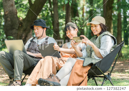 Parents and children/families chairing in parks and campsites Parents and children/families chairing in parks and campsites 127382247
