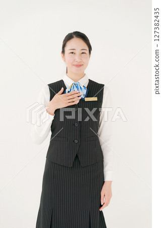 A woman in uniform A woman in uniform 127382435