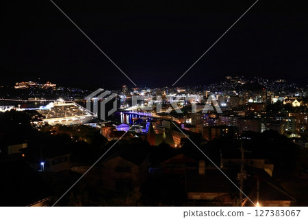 Nagasaki cityscape as seen from near the top of Glover Sky Road (luxury cruise ship docked) 127383067