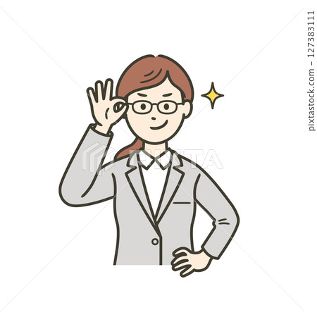 A young woman in a suit pushes up her glasses and smiles confidently 127383111