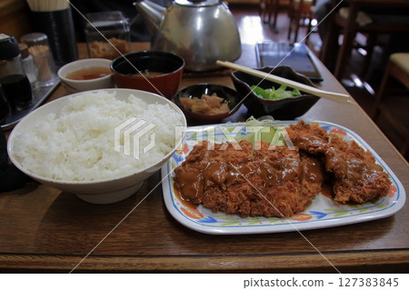 Highlight Shokudo is a famous Kyoto restaurant famous for its jumbo chicken cutlet set meal. Highlight Shokudo is a famous Kyoto restaurant famous for its jumbo chicken cutlet set meal. 127383845
