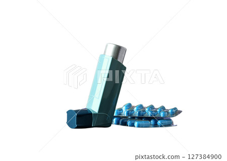 Inhaler next to blue capsules, isolated on white background Inhaler next to blue capsules, isolated on white background 127384900