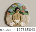 Clay Art of Meditating Man in Nature 127385843