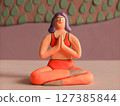 Clay Figurine of Woman in Yoga Pose 127385844