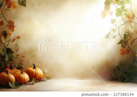 Autumn pumpkins with decorative leaves on a warm background 127386134