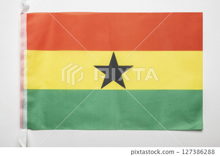 Closeup view of the Ghana national flag isolated over a white background. Concept of government and nationality 127386288