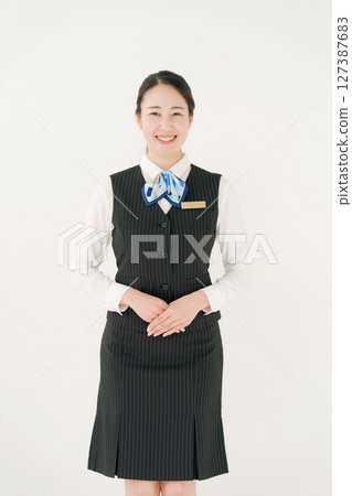A woman in uniform 127387683
