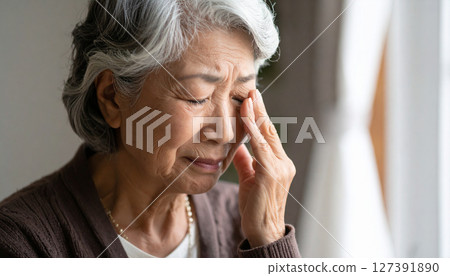 Profile of a sad elderly woman (AI-generated image) 127391890