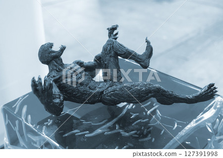 Art figure printed on a 3D printer from hardened rubber. Object created on 3D printer from hardened rubber under influence of ultraviolet light. SLA 3D printing. Stereolithography 127391998