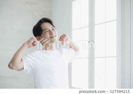 A man stretching A man stretching 127394215