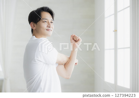 A man stretching 127394223