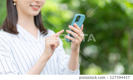 Smartphone at hand 127394457