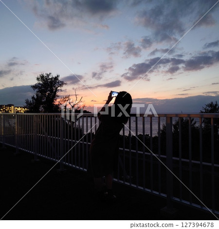 A sunset girl and a girl A sunset girl and a girl 127394678