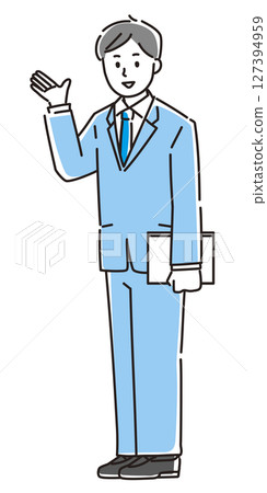 A smiling young businessman giving directions 127394959