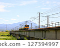 Limited express trains running on an iron bridge 127394997
