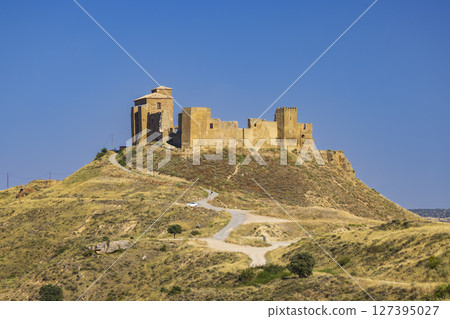 Castillo de Montearagon standing on a hill in Quicena, Spain Castillo de Montearagon standing on a hill in Quicena, Spain 127395027