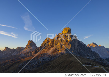 Passo Giau glowing during sunset in the Dolomites, Italy Passo Giau glowing during sunset in the Dolomites, Italy 127395191