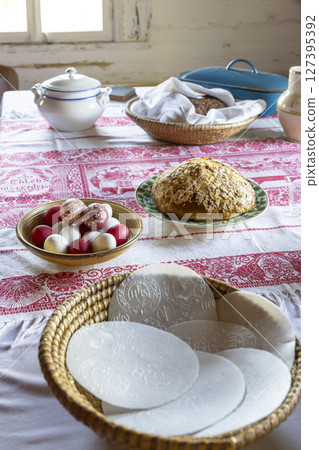 Traditional Czech Easter Table Setting with Decorated Eggs, Mazanec, and Communion Bread in Kourim Traditional Czech Easter Table Setting with Decorated Eggs, Mazanec, and Communion Bread in Kourim 127395392
