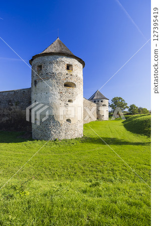 Bzovik Castle towers standing tall in Slovakia under blue sky Bzovik Castle towers standing tall in Slovakia under blue sky 127395419