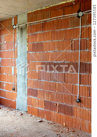 Building, construction site, brick wall 127395585