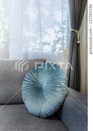 Round sofa cushion, living room interior design 127395586