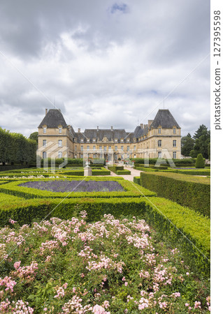 Dree Castle rising above a colorful french formal garden in Curbigny, Bourgogne Franche Comte Dree Castle rising above a colorful french formal garden in Curbigny, Bourgogne Franche Comte 127395598