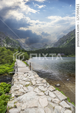Stone path leading to Popradske pleso mountain lake in High Tatras, Slovakia Stone path leading to Popradske pleso mountain lake in High Tatras, Slovakia 127395621