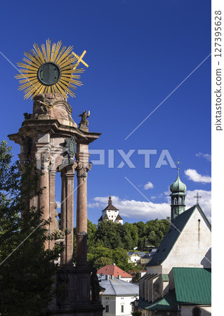 Holy Trinity Column overlooking Old Castle and Church in Banska Stiavnica, Slovakia 127395628