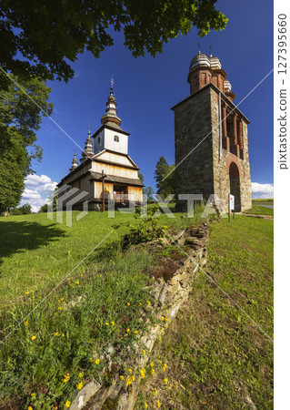 Wooden Church of Saint Michael the Archangel in Brunary, Poland, during sunny summer day 127395660