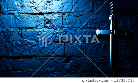 A bottle opener on a brick wall with a blue light shining through it 127395735