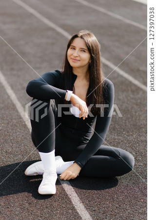 Relaxing On Track Field 127397038
