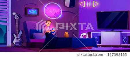 Teenager boy in bed opening glowing sci-fi cube Teenager boy in bed opening glowing sci-fi cube 127398165