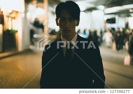 A salaryman hurrying home A salaryman hurrying home 127398277