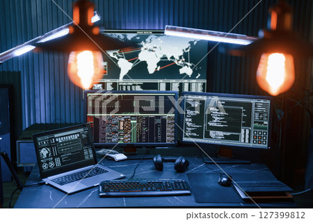 Cyber criminal haker dark room for massive attack of corporate big data servers Cyber criminal haker dark room for massive attack of corporate big data servers 127399812