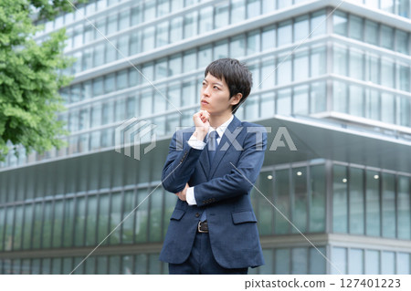 Businessman, young man, thinking Businessman, young man, thinking 127401223