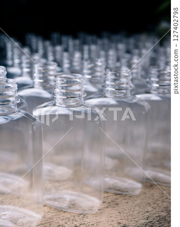 Row of plastic PET Bottles Production Line Ready for Bottling. Row of plastic PET Bottles Production Line Ready for Bottling. 127402798