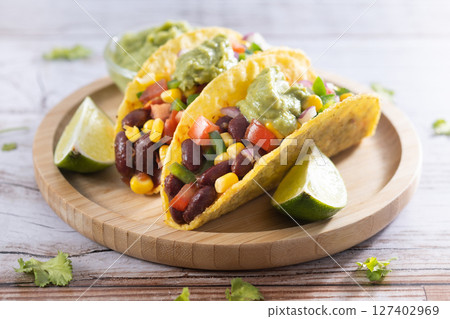 Vegan mexican Taco with beans Vegan mexican Taco with beans 127402969