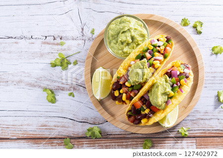 Vegan mexican Taco with beans 127402972