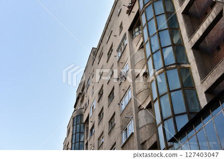 Typical facade of concrete panel building. Post Soviet flat of blocks Typical facade of concrete panel building. Post Soviet flat of blocks 127403047