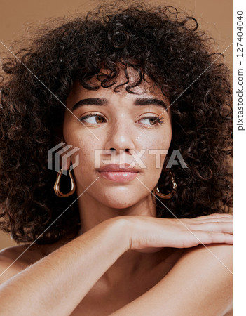 Beauty, hair and face with skincare and woman in natural cosmetics advertising, clean glow against studio background. Facial, hair care and cosmetic treatment makeup and healthy skin with wellness. 127404040