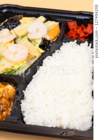 Delicious Chinese bento with fried shrimp and vegetables 127404208