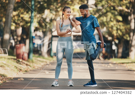 Interracial, couple and stretching for training, wellness and exercise to relax and workout in park. Health, man and woman outdoor for practice, fitness and together for bonding, healthy and talking. Interracial, couple and stretching for training, wellness and exercise to relax and workout in park. Health, man and woman outdoor for practice, fitness and together for bonding, healthy and talking. 127404382