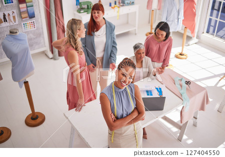 Women, arms crossed and fashion designer collaboration in clothes manufacturing boutique, workshop or fabric small business in top view. Smile, happy or creative teamwork of seamstress store workers Women, arms crossed and fashion designer collaboration in clothes manufacturing boutique, workshop or fabric small business in top view. Smile, happy or creative teamwork of seamstress store workers 127404550